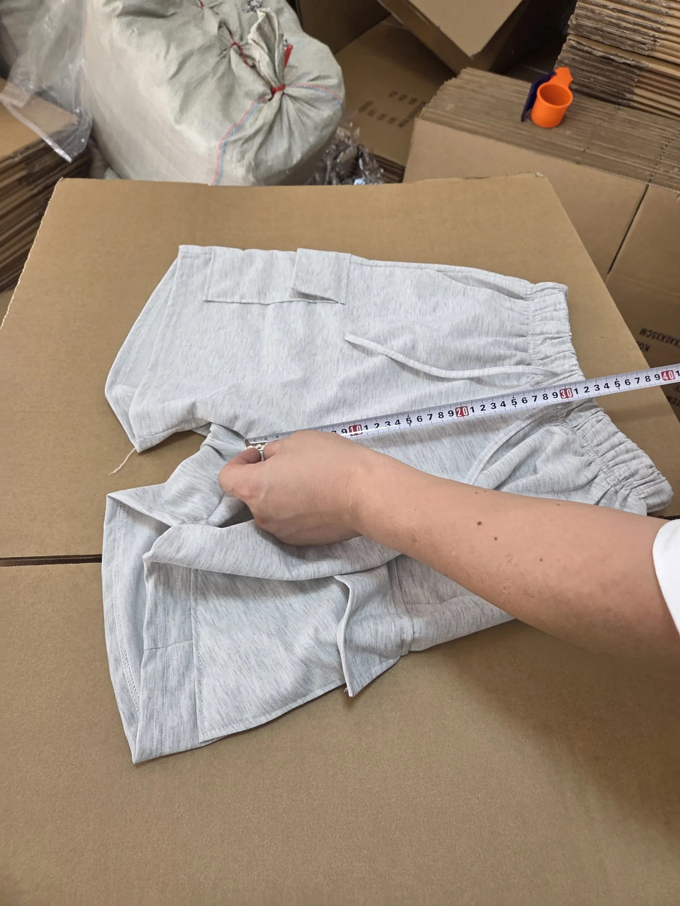 Finished garment measured against the approved sample