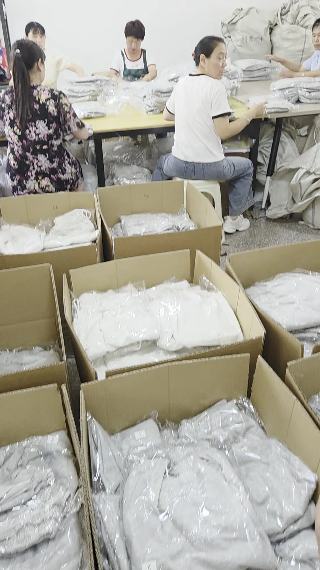 Garments packed and checked before dispatch
